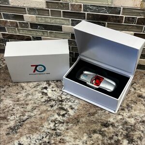 Porsche Design Silver Model Car with Red Accents